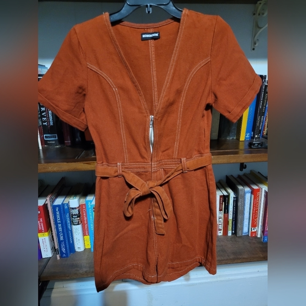 Orange denim romper with zipper closure and belt. Women's